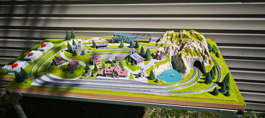 Noch Z Finished NOCH Traunstein Z Scale Layout. 3 Trains! Rokuhan Track, Marklin Conrollers, EMTZ Structures, Street/House Lights, The Works!  49" x 27"